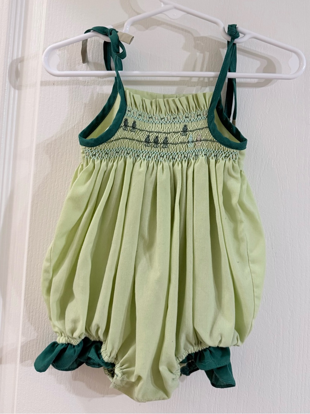 Well Dressed Wolf Light Green Bird On A Wide Smocked Bubble Romper